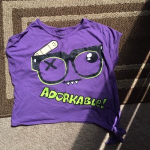 Purple shirt that says adorkable!