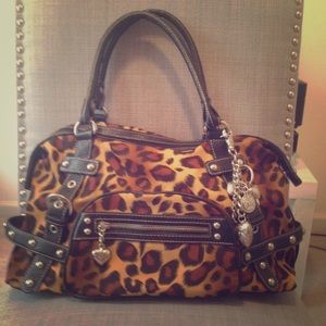 Kathy Van Zeeland leopard print purse.