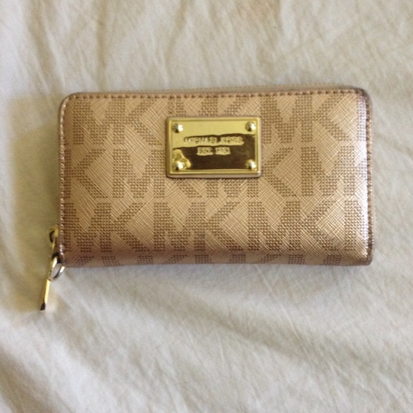 REAL Michael Kors phone wallet.