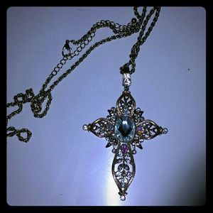 Cross rhinestone embellished necklace.