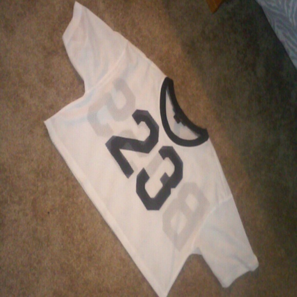 23 on the front BOSS on the back half shirt