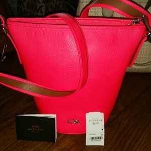 Coach neon pink leather bag with adjustable strap