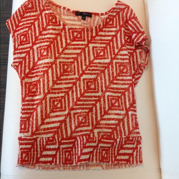 Geometric orange and cream top