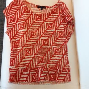 Geometric orange and cream top