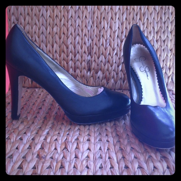 Black leather closed toe women's heels.