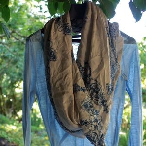 American eagle top with a free people scarf.