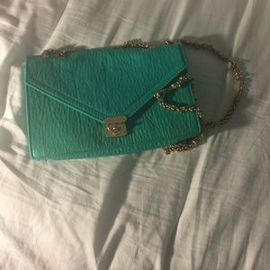 Cute turquoise fake leather purse