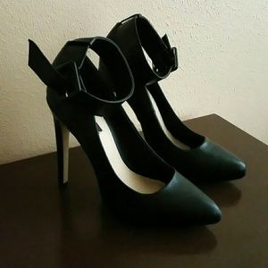Pointed ankle strap pumps