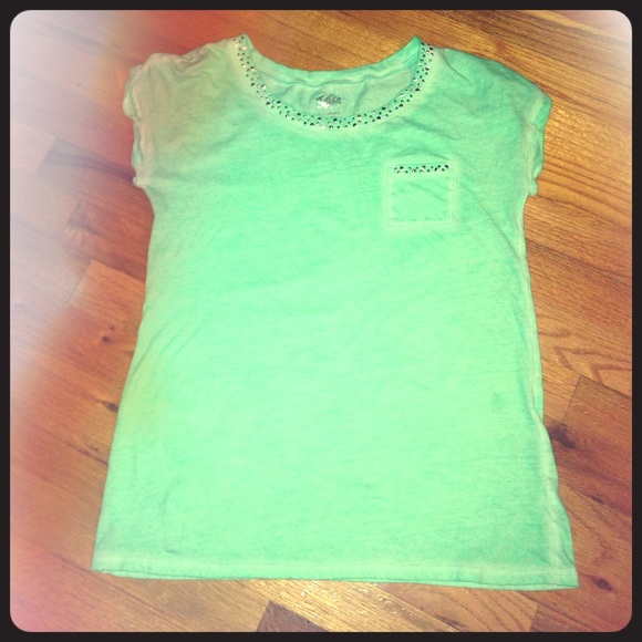 An aqua green shirt