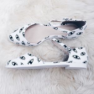 Eye printed flat sandals