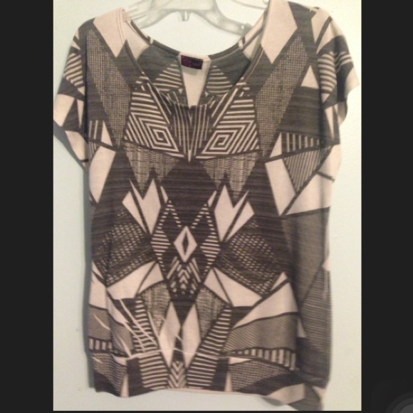 Top with geometric shapes