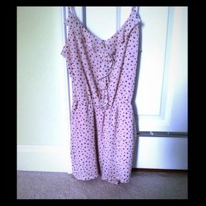 Light pink romper with black hearts