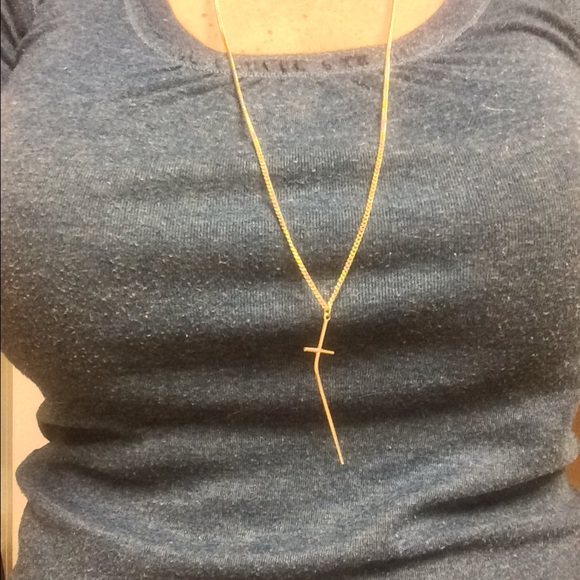 Long gold style cross necklace. Unique & chic!
