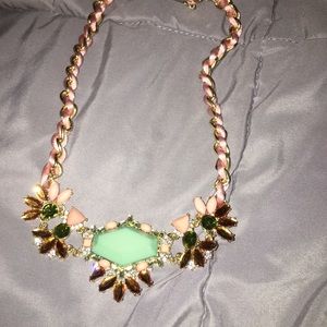 Pink and green necklace.