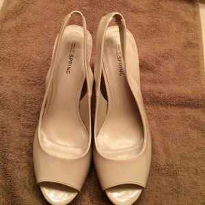 Cream color open toed shoes w/ 4" heels, size 8