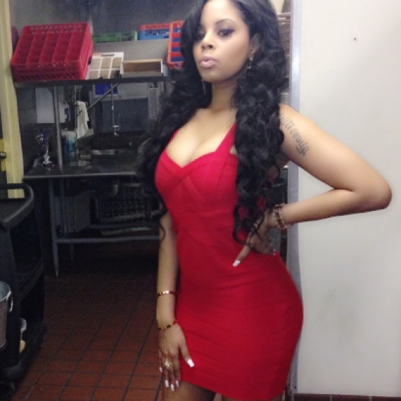 Red plunging bandage dress with criss cross straps