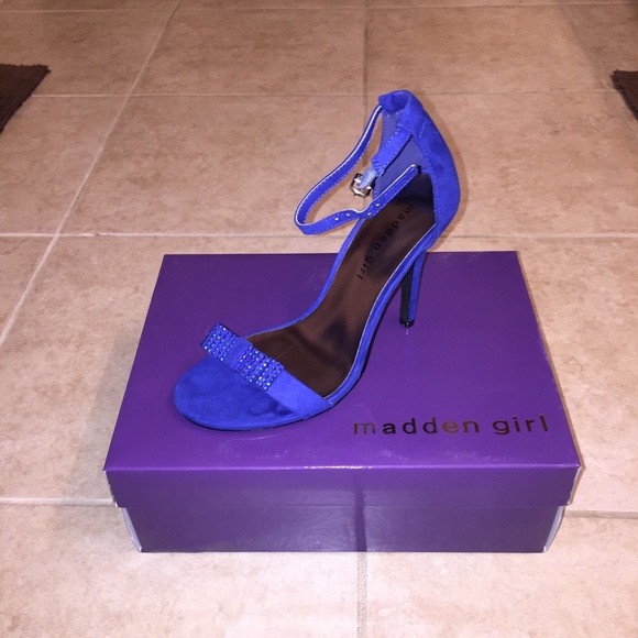Royal blue ankle strap high heels w/bow accent.
