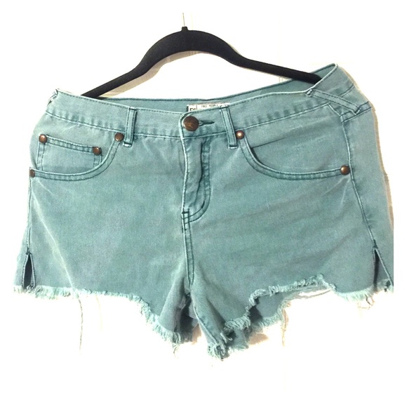 Free People faded green denim cut offs, size 29
