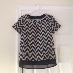 Short sleeve, chevron print blouse never worn.