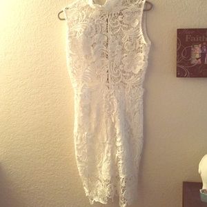 White lace dress worn once has a Cami for under