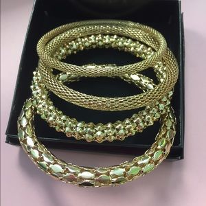 4 piece gold bracelet.