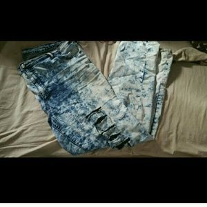 Two pairs of distressed  jeans