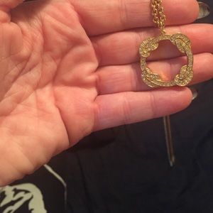Long gold with crystals coach necklace