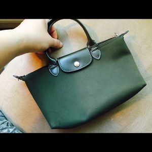 Longchamp hand bag , green color