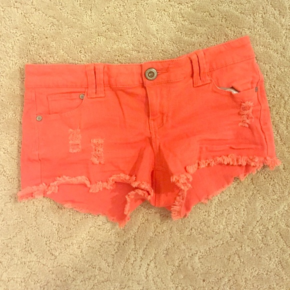 Ripped, colored jean shorts