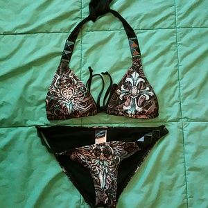 Sinful swim suit. Top medium... Bottoms small