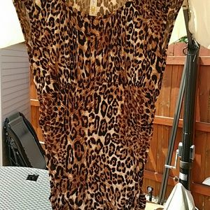 Leopard print top with ruching down side and scoop