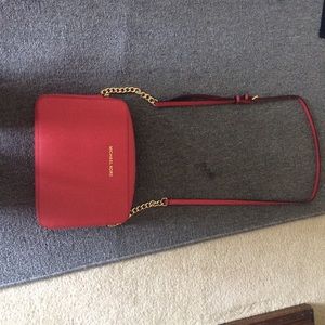 MK crossbody purse in watermelon.