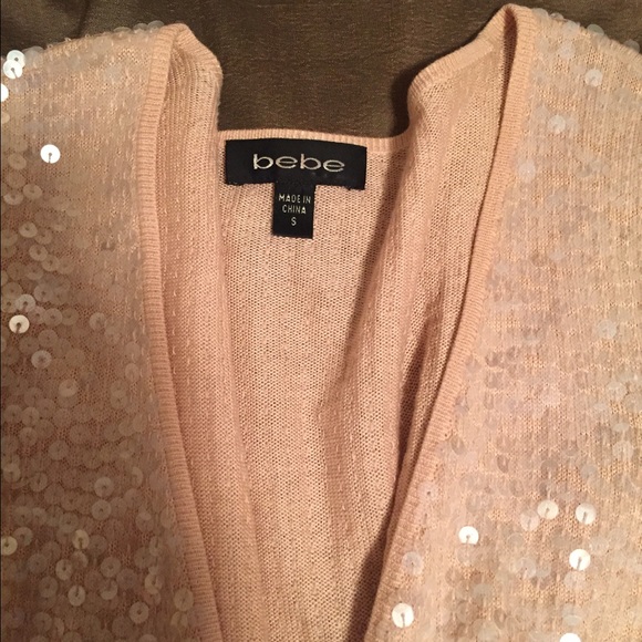 Bebe long sleeve knit sweater with sequins