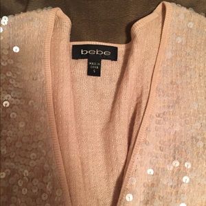 Bebe long sleeve knit sweater with sequins