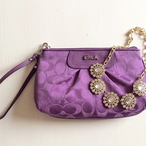 Large purple Coach wristlet NWOT