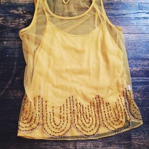 Jennifer Lopez Yellow sheer top