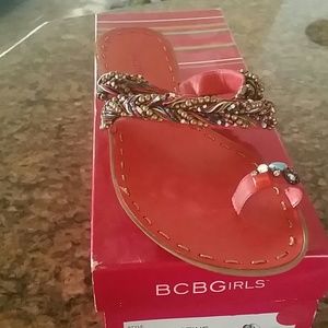Bcbg, coral colored flip flops, very pretty.