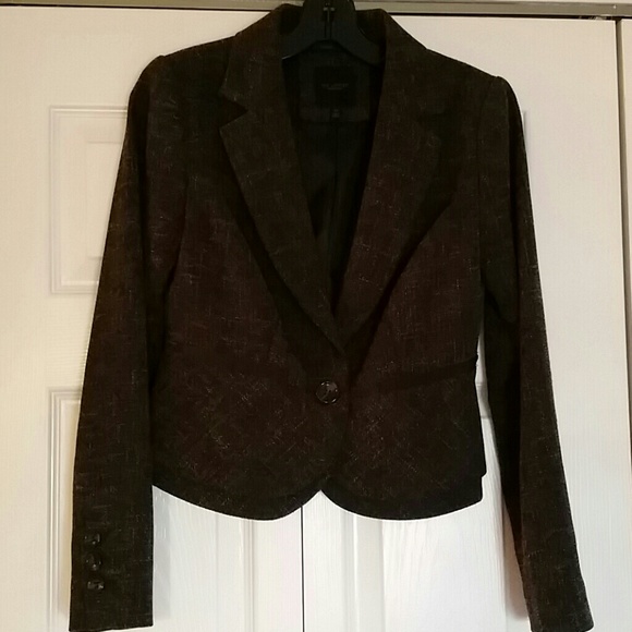 Brown jacket with scalloped back