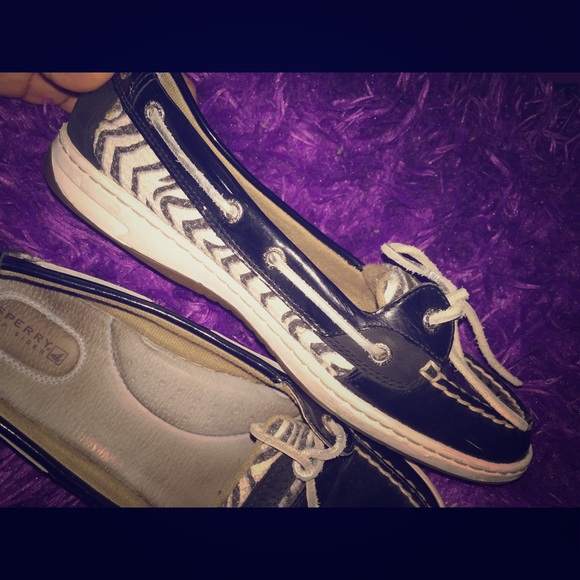 A pair of cute black and White zebra printsperrys