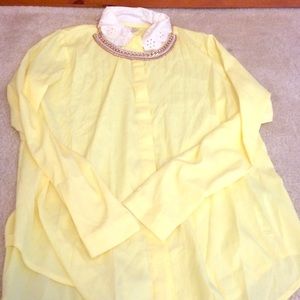 Yellow button down shirt