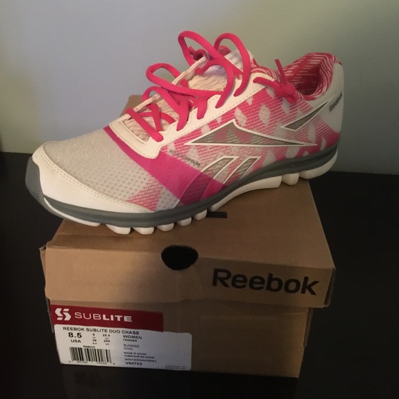 Pink and white Reebok