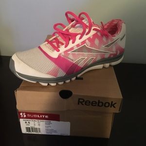Pink and white Reebok