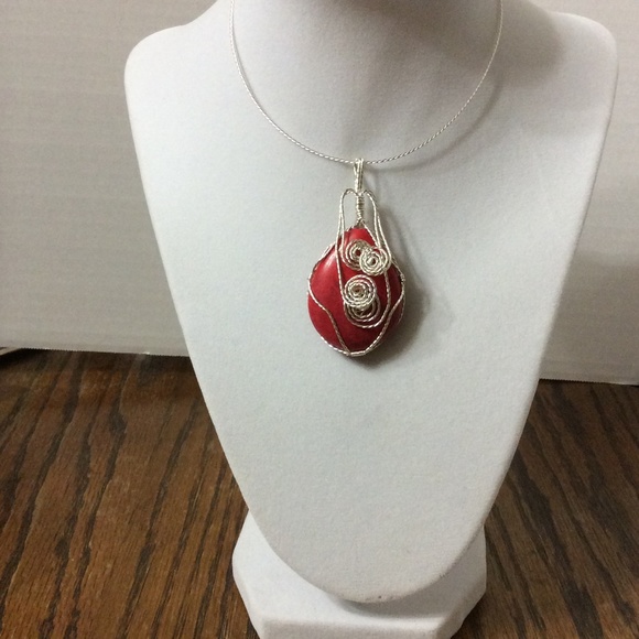 Coral colored & Silver wire .wrapped pendant
