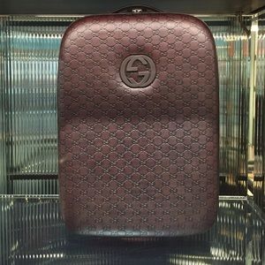 Brown Guccissima Leather Carry On