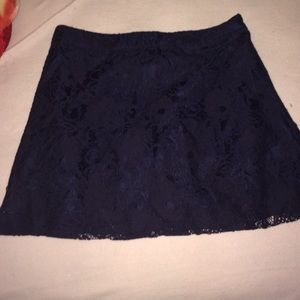 Navy blue lace skirt.
