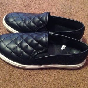 black quilted slip ons
