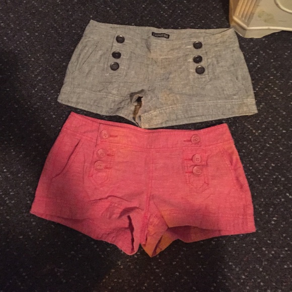 Two pairs of express shorts with side buttons