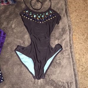 one piece swim suit never worn