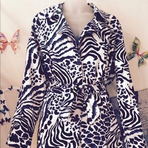 Black and white jacket with belt.