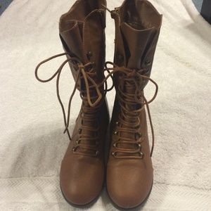 Light brown combat boots.